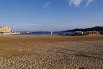 La Favire, Bucht mit Strand am Abend